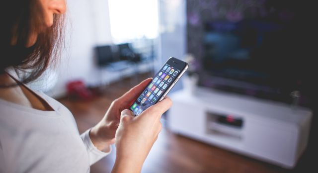 Woman Wearing White V Neck Shirt Using Space Gray Iphone 6